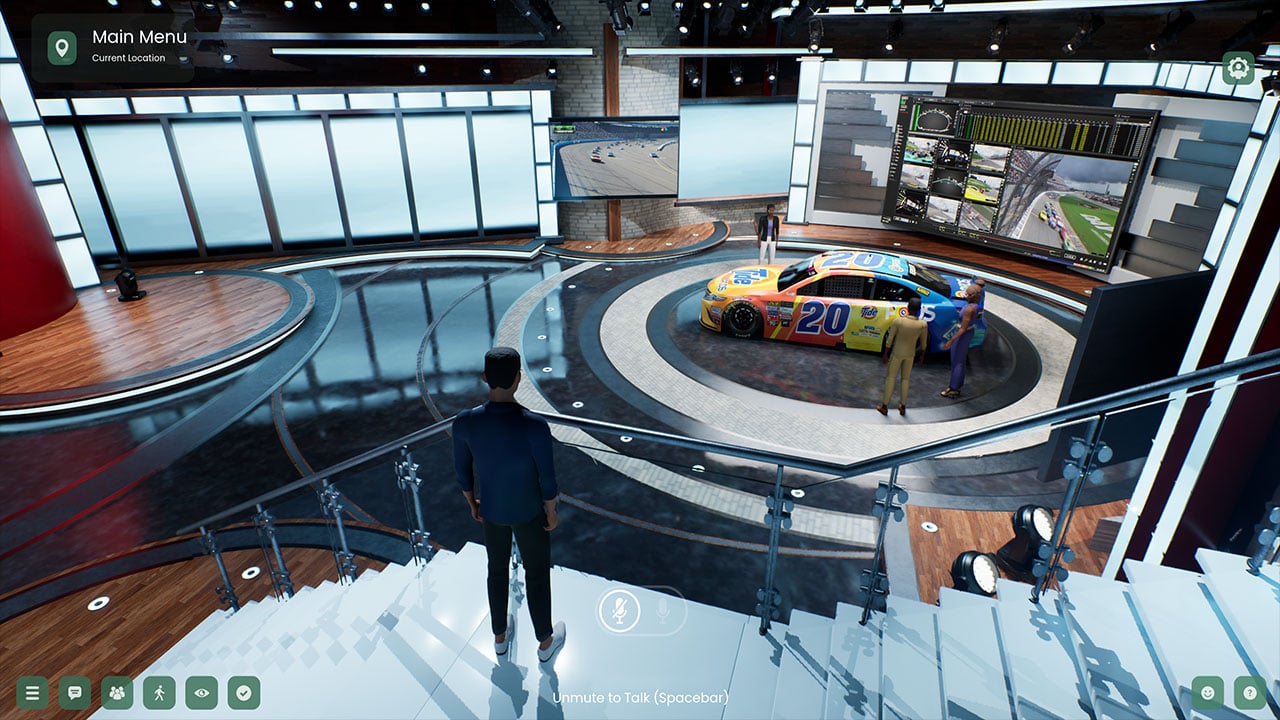 A virtual presentation room in Meadow by Bizzlogic, featuring a realistic model of a race car on display, with avatars interacting around it and large digital screens displaying related content. Meadow is designed for collaboration and interactivity, providing seamless access from web browsers and integration with business applications, making it suitable for diverse industries and use cases.